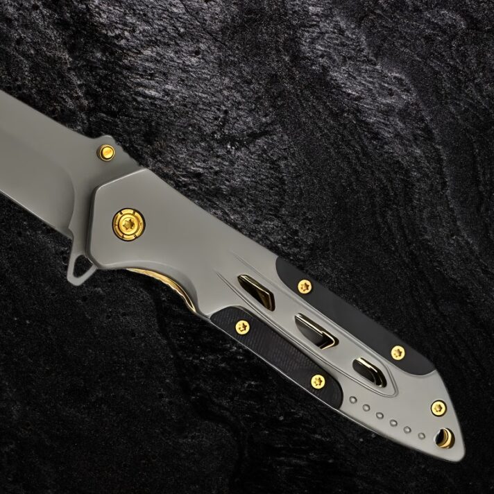 Canivete Tático Skeleton - Design Vazado + G10 + Detalhes Gold CJ-249 - Imagem 5